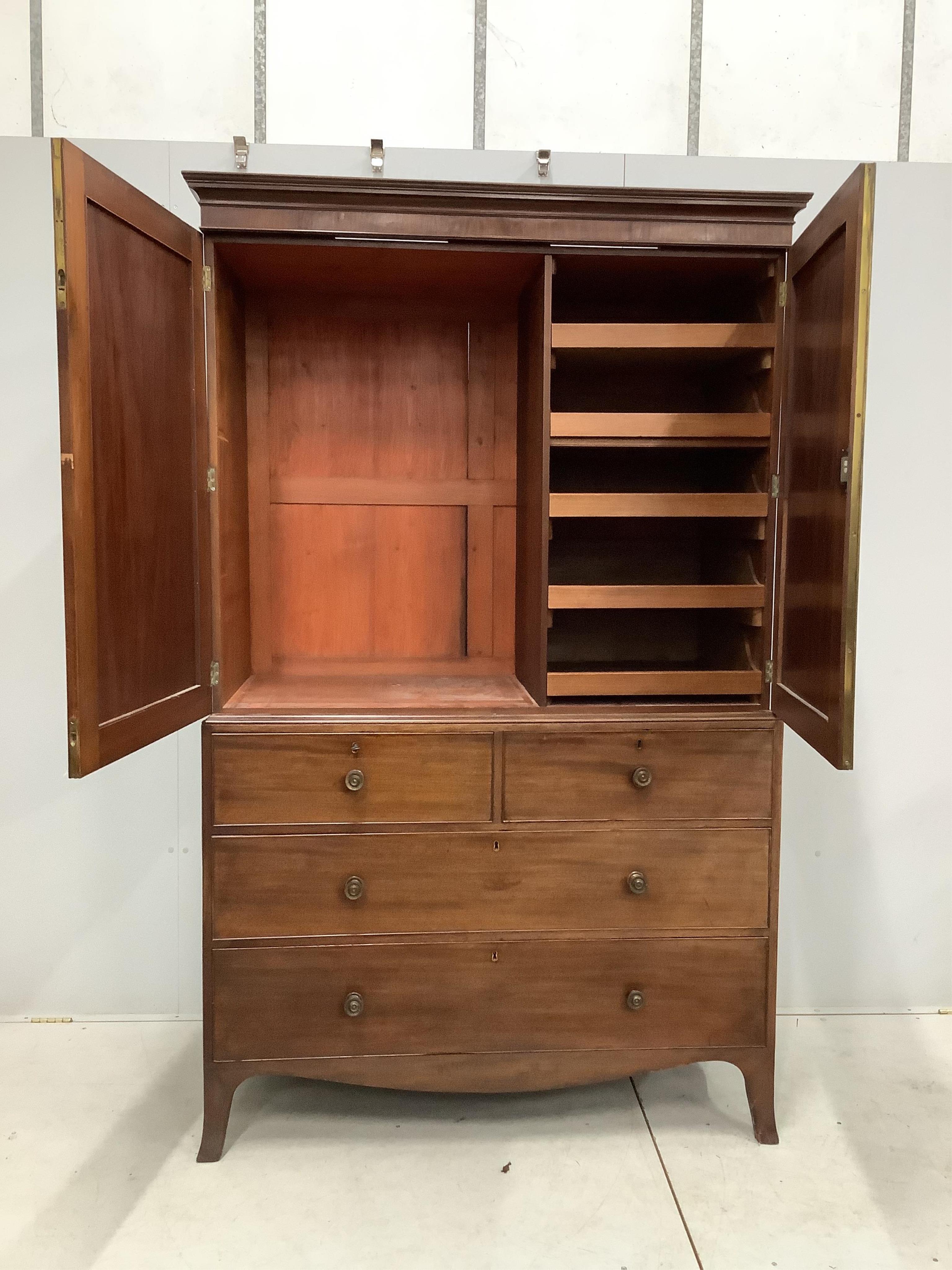 A George IV mahogany linen press, width 128cm, depth 58cm, height 208cm. Condition - fair, interior adapted